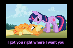 Size: 1632x1080 | Tagged: safe, derpibooru import, edit, edited screencap, screencap, applejack, twilight sparkle, earth pony, pony, unicorn, bedroom eyes, caption, female, lesbian, mare, on back, shipping, tongue out, twijack