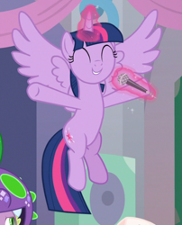 Size: 562x697 | Tagged: safe, screencap, spike, twilight sparkle, twilight sparkle (alicorn), alicorn, dragon, she's all yak, clothes, costume, cropped, cute, eyes closed, flying, glowing horn, horn, levitation, magic, microphone, offscreen character, smiling, solo focus, spread wings, t pose, telekinesis, twiabetes, winged spike, wings