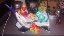 Size: 960x539 | Tagged: safe, derpibooru import, big macintosh, fluttershy, lyra heartstrings, sunset shimmer, pegasus, pony, astrotrain, attack, blind bag, bundle, decepticon, help me, toy, transformers