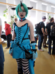 Size: 3456x4608 | Tagged: safe, artist:juu50x, queen chrysalis, human, clothes, cosplay, dress, finland, finlandia hall, irl, irl human, photo, pose, socks, solo, striped socks