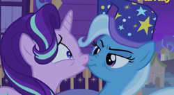 Size: 642x352 | Tagged: safe, derpibooru import, screencap, starlight glimmer, trixie, pony, to where and back again, boop, hat, lidded eyes, looking at each other, misleading thumbnail, nightcap, nose wrinkle, noseboop, not what it looks like, out of context, unamused, wide eyes