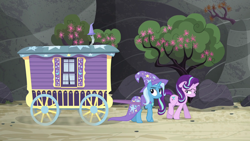 Size: 1920x1080 | Tagged: safe, derpibooru import, screencap, starlight glimmer, trixie, pony, unicorn, to where and back again, cape, clothes, duo, female, flower, hat, mare, tree, trixie's wagon, wagon, wizard hat