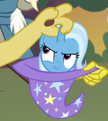 Size: 344x384 | Tagged: safe, derpibooru import, screencap, discord, trixie, pony, unicorn, to where and back again, annoyed, cropped, female, frown, glare, horn grab, mare, trixie's hat