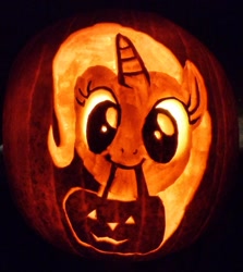 Size: 965x1080 | Tagged: safe, artist:michael rice, derpibooru import, trixie, pony, unicorn, to saddlebags and back again, halloween, holiday, jack-o-lantern, mouth hold, pumpkin, pumpkin bucket, pumpkin carving, smiling, solo