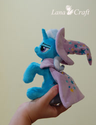 Size: 1200x1566 | Tagged: safe, artist:lanacraft, derpibooru import, trixie, human, hand, irl, irl human, lidded eyes, photo, plushie, raised hoof, sitting, trixie's cape, trixie's hat