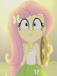 Size: 618x819 | Tagged: safe, screencap, fluttershy, equestria girls, rainbow rocks, face, musical instrument, spotlight, tambourine