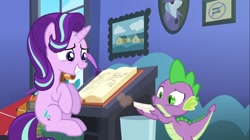 Size: 1100x618 | Tagged: safe, derpibooru import, screencap, spike, starlight glimmer, trixie, dragon, pony, unicorn, every little thing she does, sitting, starlight's room
