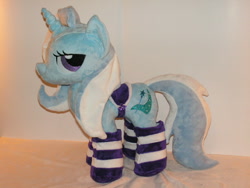 Size: 900x675 | Tagged: safe, artist:karasunezumi, derpibooru import, trixie, pony, unicorn, bedroom eyes, clothes, female, irl, mare, photo, plushie, saddle, socks, solo, striped socks