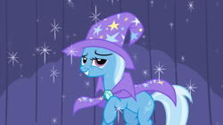 Size: 1600x893 | Tagged: safe, artist:anitech, derpibooru import, trixie, grin, lidded eyes, looking at you, raised hoof, smiling, sparkles, stage