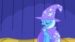 Size: 1280x720 | Tagged: safe, derpibooru import, screencap, trixie, pony, boast busters, cape, clothes, eyes closed, hat, open mouth, solo, trixie's cape, trixie's hat