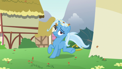 Size: 1280x720 | Tagged: safe, derpibooru import, screencap, trixie, pony, all bottled up, cinnamon nuts, circling stars, derp, dizzy, food, nuts, raised hoof, solo