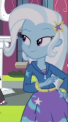 Size: 342x616 | Tagged: safe, derpibooru import, screencap, trixie, equestria girls, rainbow rocks, better than ever, canterlot high, clothes, cropped, hoodie, jacket, lidded eyes, skirt, solo