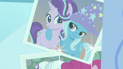 Size: 1920x1080 | Tagged: safe, derpibooru import, screencap, starlight glimmer, trixie, pony, unicorn, celestial advice, clothes, hat, looking at each other, photo, smiling, trixie's hat