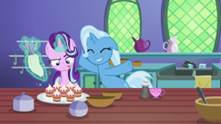 Size: 1920x1080 | Tagged: safe, derpibooru import, screencap, starlight glimmer, trixie, pony, all bottled up, cup, duo, floppy ears, icing bag, magic, salt shaker, teacakes, teacup, tongue out