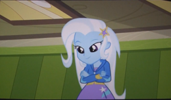 Size: 1409x825 | Tagged: safe, derpibooru import, screencap, trixie, equestria girls, equestria girls (movie), lidded eyes, solo