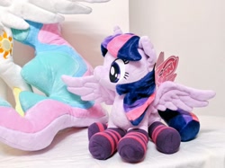 Size: 1024x767 | Tagged: safe, artist:nekokevin, princess celestia, twilight sparkle, twilight sparkle (alicorn), alicorn, pony, clothes, cute, female, irl, lying down, mare, photo, plushie, smiling, socks, striped socks