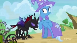 Size: 1280x720 | Tagged: safe, derpibooru import, screencap, pharynx, trixie, changeling, to change a changeling, cape, cliff, clothes, hat, road, tree, trixie's cape, trixie's hat