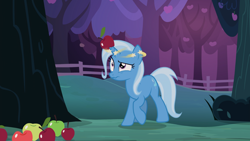 Size: 1646x926 | Tagged: source needed, safe, derpibooru import, screencap, trixie, uncommon bond, apple, circling stars, dizzy, food, horn impalement, solo