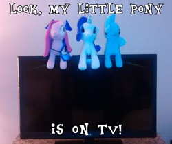 Size: 832x699 | Tagged: safe, artist:onlyfactory, derpibooru import, pinkie pie, rarity, trixie, earth pony, pony, unicorn, bootleg, female, funny, irl, literal minded, mare, meme, photo, pinkamena diane pie, plushie, pun, television, text, title drop, visual pun