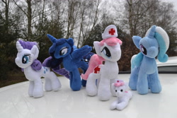 Size: 4608x3072 | Tagged: safe, artist:hampshirebrony, nurse redheart, princess luna, rarity, trixie, pony, unicorn, female, irl, mare, photo, plushie