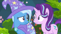 Size: 1136x640 | Tagged: safe, derpibooru import, screencap, starlight glimmer, trixie, pony, unicorn, to change a changeling, cape, clothes, confused, hat, looking at each other, shocked, trixie's cape, trixie's hat