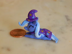 Size: 4608x3456 | Tagged: safe, artist:tinyblissfulness, derpibooru import, trixie, pony, unicorn, eyes closed, female, irl, mare, penny, photo, prone, sculpture, solo, traditional art