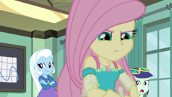 Size: 1280x720 | Tagged: safe, derpibooru import, screencap, blueberry cake, fluttershy, trixie, a little birdie told me, better together, equestria girls, background human, female, geode of fauna, magical geodes