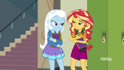 Size: 1280x720 | Tagged: safe, derpibooru import, screencap, sunset shimmer, trixie, better together, equestria girls, forgotten friendship, book, discovery family logo, duo, female, looking at each other
