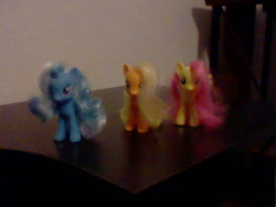 Size: 640x480 | Tagged: safe, derpibooru import, applejack, fluttershy, trixie, earth pony, pony, irl, photo, toy