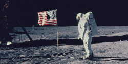 Size: 628x314 | Tagged: safe, artist:judhudson, derpibooru import, edit, trixie, human, american flag, apollo 11, astronaut, clothes, cosplay, costume, fursuit, irl, irl human, moon, photo, united states, when you see it