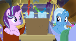 Size: 1735x937 | Tagged: safe, derpibooru import, screencap, starlight glimmer, trixie, pony, unicorn, road to friendship, duo, duo female, female, hammock, mare, smiling, trixie's wagon