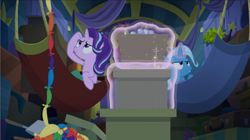 Size: 1571x880 | Tagged: safe, derpibooru import, screencap, starlight glimmer, trixie, pony, unicorn, road to friendship, boxes, duo, duo female, female, hammock, magic, mare, telekinesis, trixie's wagon