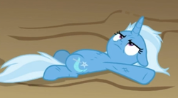 Size: 456x252 | Tagged: safe, derpibooru import, screencap, trixie, pony, unicorn, road to friendship, annoyed, female, floppy ears, mare, on back, solo