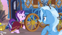 Size: 1280x720 | Tagged: safe, derpibooru import, screencap, starlight glimmer, trixie, pony, unicorn, road to friendship, clothes, crying, duo, duo female, female, hoo'far's wagon, mare, messy mane, robe, teary eyes, tree branch, wagon