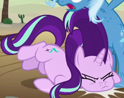 Size: 574x458 | Tagged: safe, derpibooru import, screencap, starlight glimmer, trixie, pony, unicorn, road to friendship, cropped, duo, duo female, faceplant, falling, female, mare, messy mane, solo focus