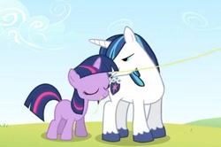 Size: 454x301 | Tagged: safe, screencap, shining armor, twilight sparkle, pony, unicorn, a canterlot wedding, bedroom eyes, filly, kite, out of context, teenager