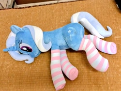 Size: 1024x768 | Tagged: safe, artist:nekokevin, derpibooru import, trixie, pony, unicorn, clothes, cute, female, irl, lying down, mare, photo, plushie, smiling, socks, solo, striped socks