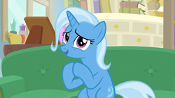 Size: 1920x1080 | Tagged: safe, derpibooru import, screencap, trixie, pony, unicorn, road to friendship, female, hooves together, mare, sitting, smiling, sofa, solo