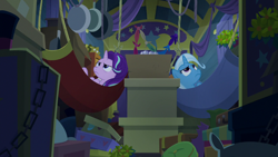 Size: 1280x720 | Tagged: safe, derpibooru import, screencap, starlight glimmer, trixie, pony, unicorn, road to friendship, clutter, duo, female, frying pan, hammock, luggage, mare, trixie's wagon