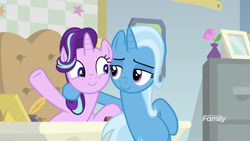 Size: 1920x1080 | Tagged: safe, derpibooru import, screencap, starlight glimmer, trixie, pony, unicorn, road to friendship, desk, duo, female, looking at each other, mare, smiling