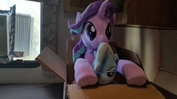 Size: 1200x675 | Tagged: safe, artist:nekokevin, derpibooru import, starlight glimmer, trixie, pony, unicorn, series:nekokevin's glimmy, box, duo, female, irl, mare, photo, plushie, pony in a box, raised hoof, size difference, smiling, underhoof