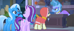 Size: 1920x805 | Tagged: safe, derpibooru import, screencap, desert flower, starlight glimmer, trixie, pony, unicorn, road to friendship, clothes, female, hijab, key, mare, mouth hold, mrs. trotsworth, somnambula (location), somnambula resident, tail wrap