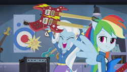 Size: 1280x720 | Tagged: safe, derpibooru import, screencap, rainbow dash, trixie, equestria girls, guitar centered, rainbow rocks, double neck guitar, electric guitar, grin, guitar, laughing, open mouth, ponied up, poster, smiling