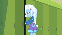 Size: 1920x1080 | Tagged: safe, derpibooru import, screencap, trixie, better together, equestria girls, forgotten friendship, canterlot high, clothes, hallway, hoodie, lockers, smiling, solo