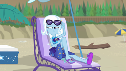 Size: 1920x1080 | Tagged: safe, derpibooru import, screencap, trixie, equestria girls, equestria girls series, forgotten friendship, beach, beach babe, beach chair, beach umbrella, clothes, driftwood, fainting couch, feet, flip-flops, sandals, sarong, solo, sunglasses, swimsuit, unamused