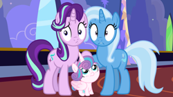 Size: 1190x670 | Tagged: safe, derpibooru import, edit, edited screencap, screencap, princess flurry heart, starlight glimmer, trixie, alicorn, pony, unicorn, baby, baby pony, female, foalsitting, holding hooves