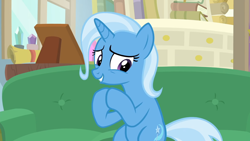 Size: 1920x1080 | Tagged: safe, derpibooru import, screencap, trixie, pony, road to friendship, female, lip bite, mare, sofa, solo, worried