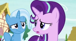 Size: 925x506 | Tagged: safe, derpibooru import, screencap, starlight glimmer, trixie, pony, unicorn, to where and back again, confused, female, looking at each other, looking back, mare, ponyville