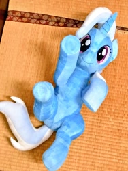 Size: 768x1024 | Tagged: safe, artist:nekokevin, derpibooru import, trixie, pony, unicorn, cute, diatrixes, female, irl, looking at you, lying down, mare, on back, photo, plushie, raised hoof, smiling, solo, underhoof