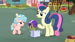 Size: 1600x900 | Tagged: safe, screencap, bon bon, cozy glow, sweetie drops, earth pony, pegasus, pony, marks for effort, cactus, duo, female, filly, helmet, mare, raised hoof, shopping bags